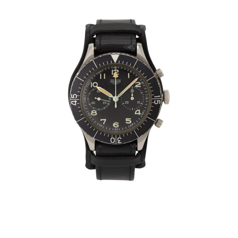 Chronographe flyback Heuer Bundeswehr réf. 1550 SG en acier, cadran noir à deux compteurs, lunette tournante